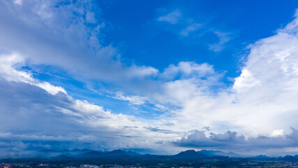Fototapeta premium Blue sky and white clouds on the mountain after rain