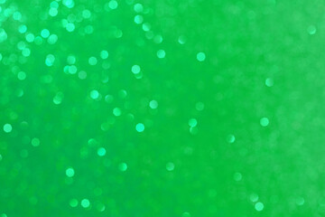 Abstract green background. Beautiful bokeh effect. Light circles background.