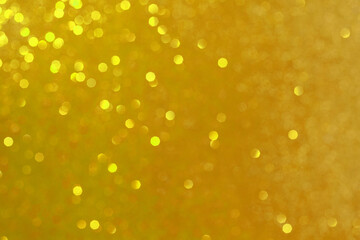 Abstract golden background. Beautiful bokeh effect. Light circles background.