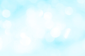 Bokeh light on blue background, sky with circle glitter light blue. Snow abstract soft glowing with vivid bright light and bokeh blur effect. 