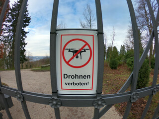 Drachenfels / Konigswinter / Germany - December 29, 2019: Drones forbidden sign outside the Schloss Drachenburg Castle. No-Drone-Zone warning sign on the fence.