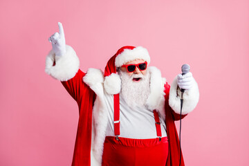 North-pole celebrity white grey hair beard santa claus big belly sing x-mas christmas songs hold...