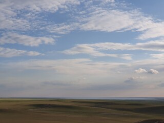 Fototapeta na wymiar Nature, Freedom, sky, beauty, Uzbekistan, desert in winter, road