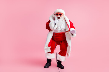 Full length photo crazy grey beard santa claus big abdomen sing song mic enjoy x-mas christmas...