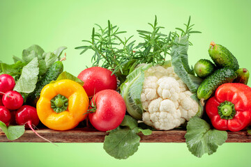 Various fresh raw vegetables, frontal view.