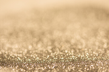abstract blurred gold bokeh background. festive decoration for website and banner or card design concept