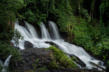 Fototapeta na wymiar Pha suea Waterfall located in Tham Pla -Namtok Pha Suea National Park, Mae Hong Son Province, Thailand