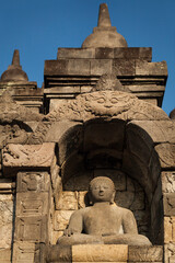 One of the Buddha statues of Borobudur Buddhist Temple in Java, Indonesia