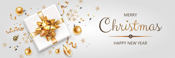 Fototapeta na wymiar Horizontal banner with gold and silver Christmas symbols and text. Christmas gifts, decoration and other festive elements on light background.