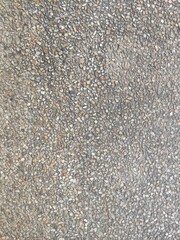 A road surface or pavement is the durable surface material laid down on an area intended to sustain vehicular or foot traffic such as a road or walkway.