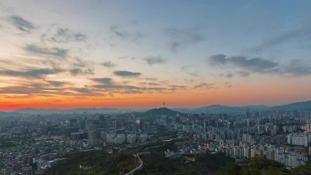 Time lapse. view of sunrise seoul city scape and Downtown skyline, The best view of Seoul South,Korea.(zoom in)