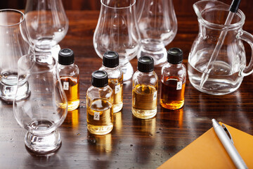 tasting bottles and glasses of whisky spirit brandy cognac. tasting at home