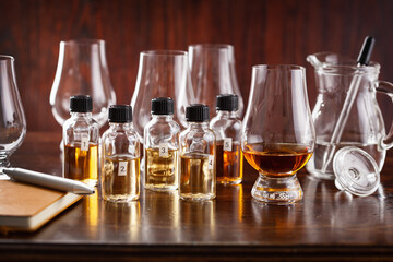 tasting bottles and glasses of whisky spirit brandy cognac. tasting at home