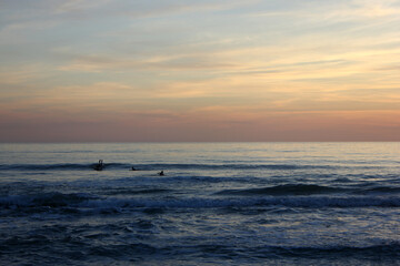 Surfing in corona times at Forte dei Marmi, Tuscany, Italy