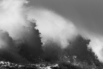 Big waves crashing over the pier of Ijmuiden, Netherlands