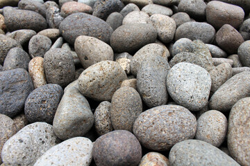 Pebbles, rocks, and stones as natural decoration in the garden.