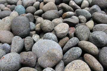 Pebbles, rocks, and stones as natural decoration in the garden.