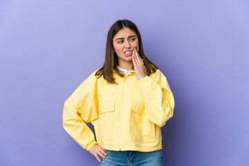 Fototapeta premium Young caucasian woman having a strong teeth pain, molar ache.