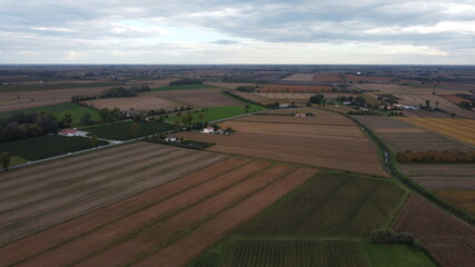 Obraz premium agriculture, field drone view. Aerial view; Soil rows