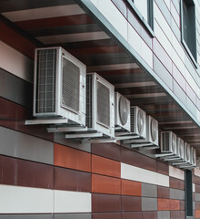 Outdoor split system units on the wall