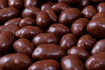 Close up of chocolate glazed peanuts.