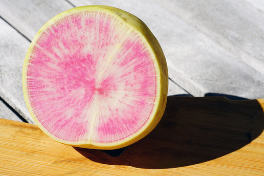 Green And Pink Watermelon Radish Cut In Half