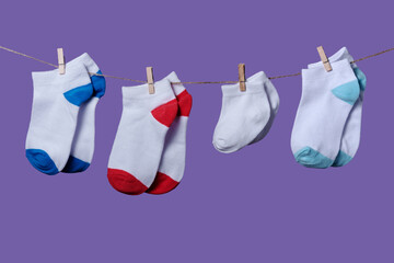 Premature baby day concept. Tiny socks