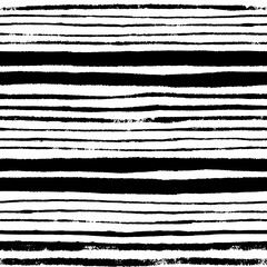 Abstract noisy textured striped background. Seamless pattern with hand painted grunge ink doodles in black and white. Vector.
