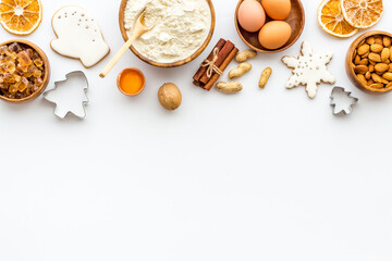 Christmas cooking background with gingerbread cookies, overhead view, flat lay