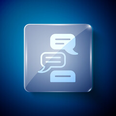 White Speech bubble chat icon isolated on blue background. Message icon. Communication or comment chat symbol. Square glass panels. Vector.