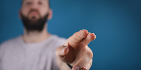 young man touch something with his finger