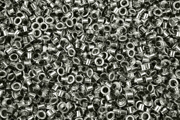 Metal eyelets for sewing. Grommets for clothes.