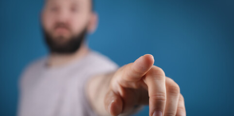 young man touch something with his finger