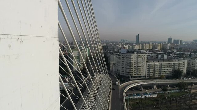 Traffic on the Basarab Suspended Bridge on a sunny day in Bucharest.