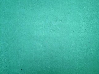 Full frame shot of teal green wall background.