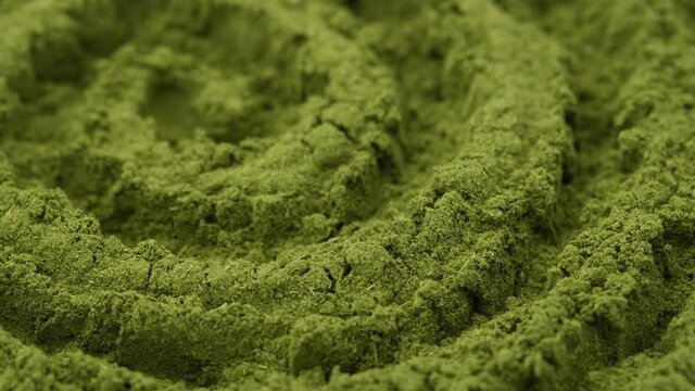 superfoods chlorella or spirulina powder rotating. creative video