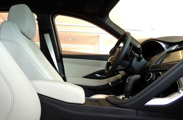 White Leather Upholstery Inside Car Side View 