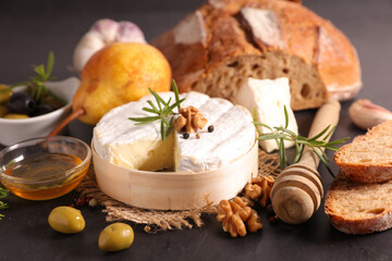 Fototapeta na wymiar cheese, walnut, bread and honey