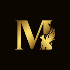 Griffin silhouette inside gold letter M. Heraldic symbol beast ancient mythology or fantasy. Creative design elements for logotype, emblem, monogram, icon or symbol for company, corporate, brand name.