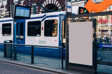 Tram near modern public transport station in urban area