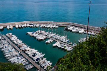 Alassio city center and marine, Italian roman city of the Ligurian riviera, in summer days with blue sky