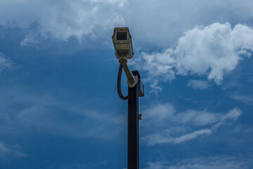 closed circuit camera Split on the sky background
