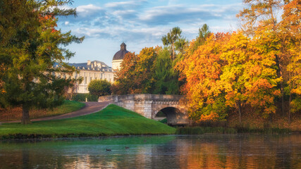 ancient palace and park in the city of Gatchina. Landscape in golden autumn.