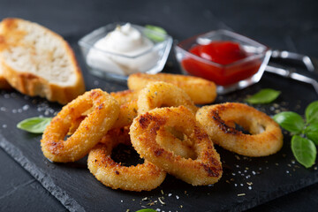 Squid rings or onion rings with sauces