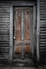 Spooky Door on Old Wooden Structure