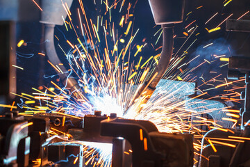 Welding robots movement in a car factory
