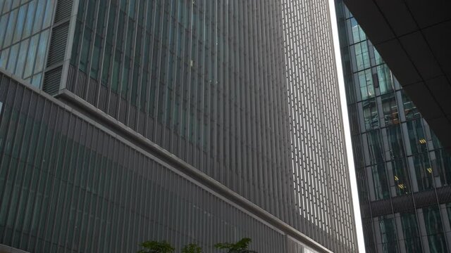 day time hangzhou city downtown modern office building front slow motion view 4k china