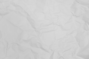 White crumpled paper texture background.