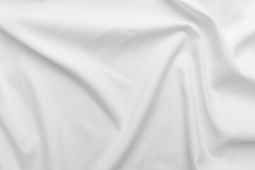 Abstract white fabric texture background. Cloth soft wave. Creases of satin. silk and cotton.	