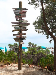 signpost on the beach